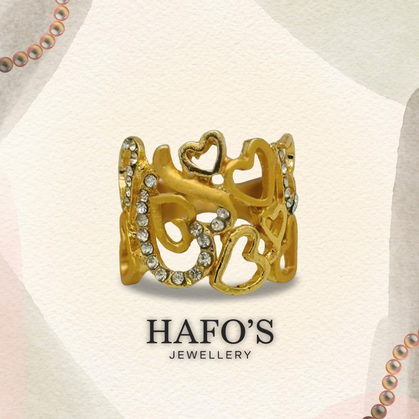 Gold ring with intricate design and gemstones on a light background with 'HAFO'S JEWELLERY' branding.